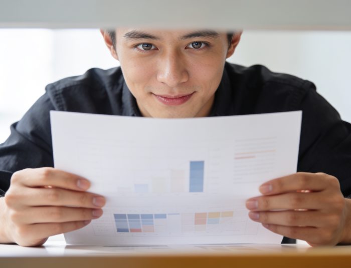 Designer analyzing workflow on modern workstation hardware.